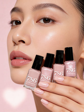 Woman holding 786 nail polish bottles with a pink background